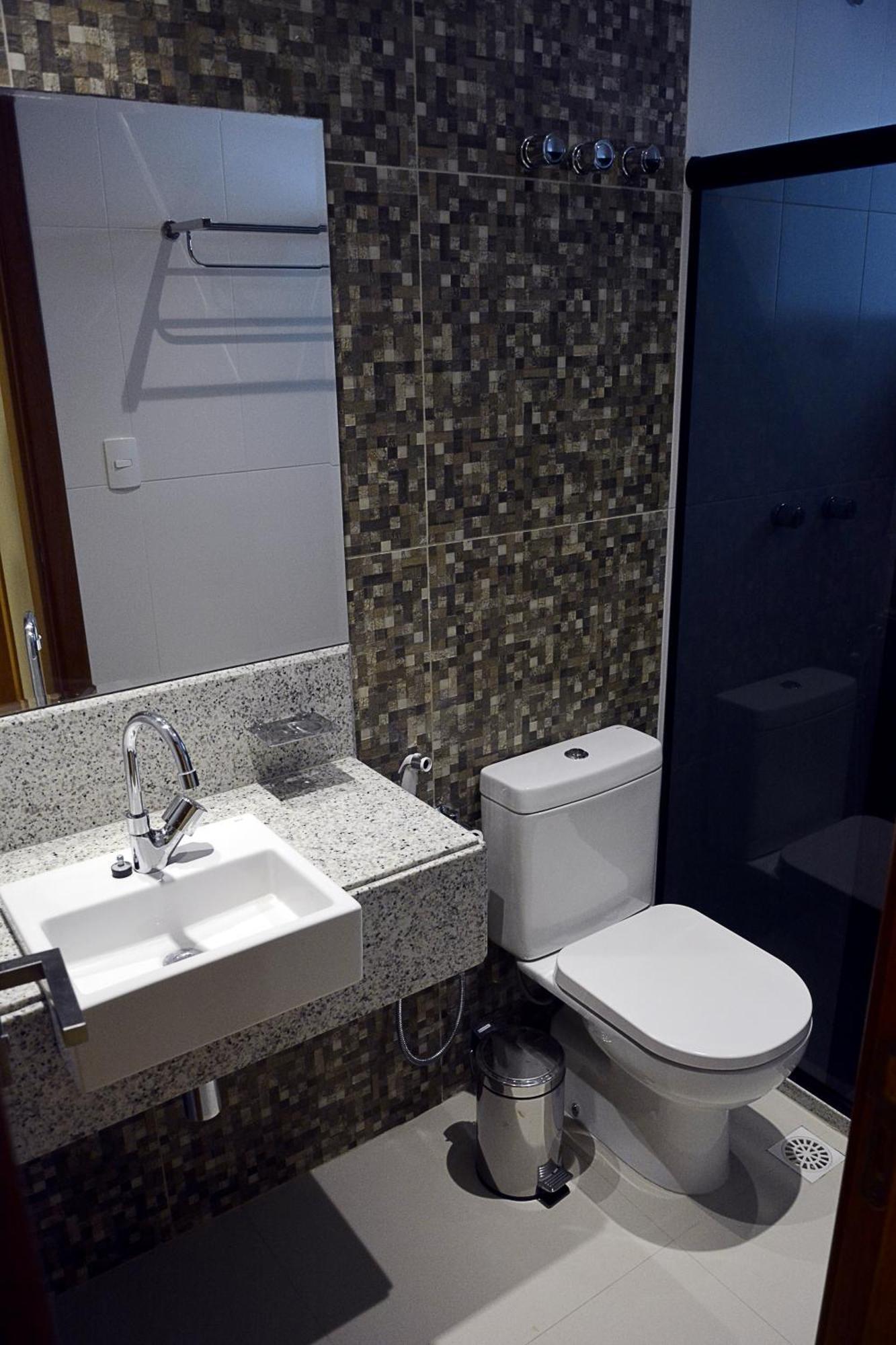 Quarto Triplo Executivo